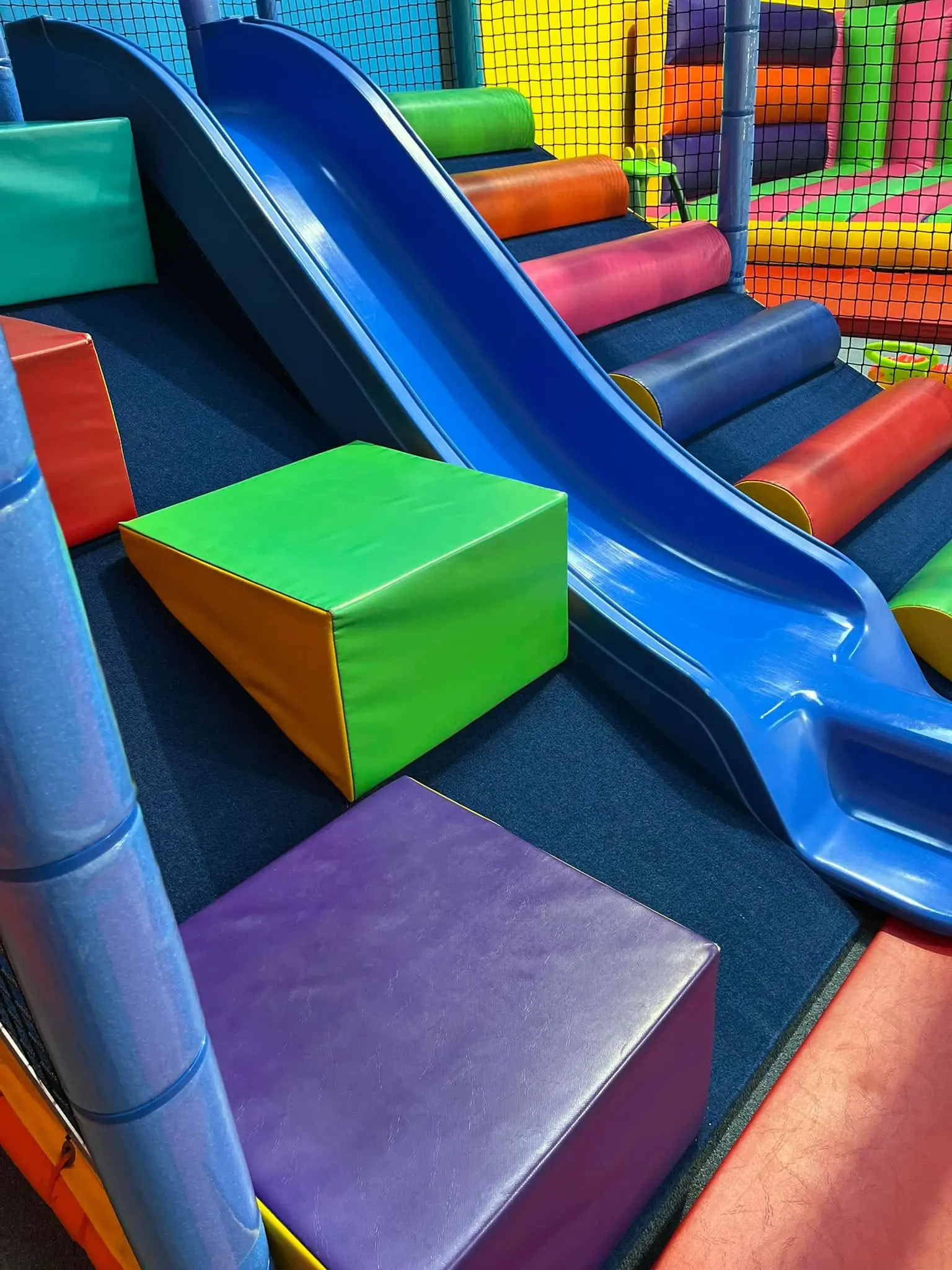 Soft play blocks and slide in the toddler play area at Meerkat Manner, Ocean Grove